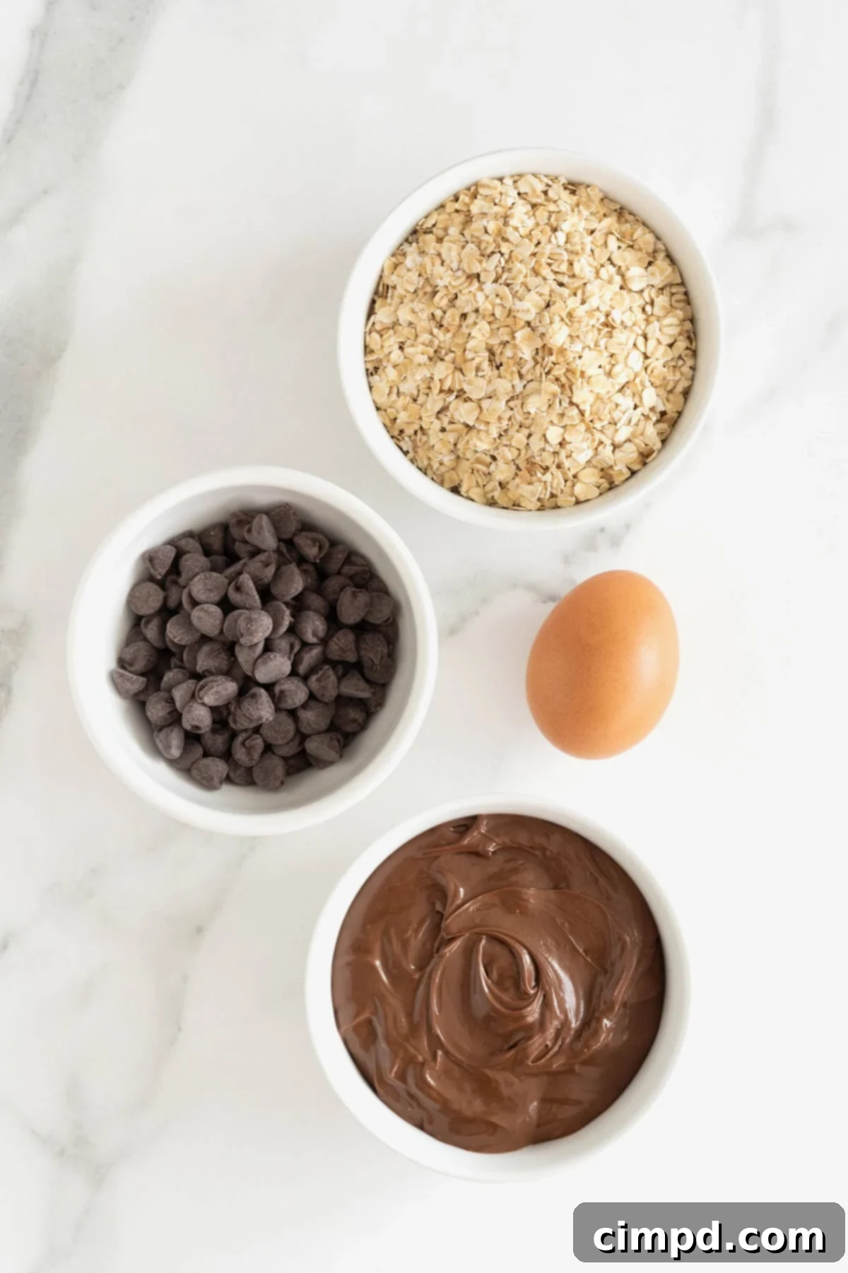 Ingredients to make Flourless Nutella Cookies.