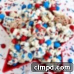 Homeland Harmony Bites 4 Patriotic Party Mix with red, white, and blue M&M's and sprinkles.