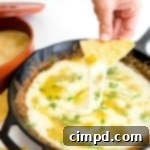 Small image of a bubbling skillet of Queso Fundido