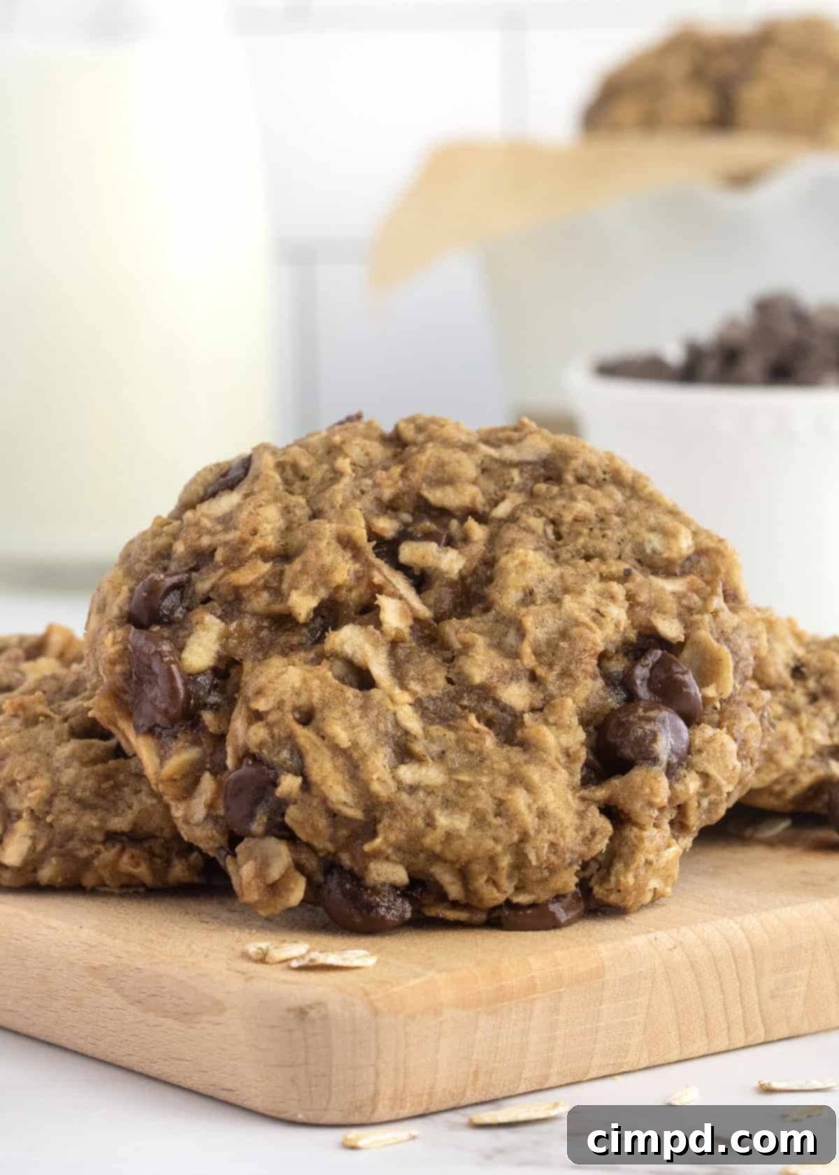A breakfast cookie on a wooden food board.