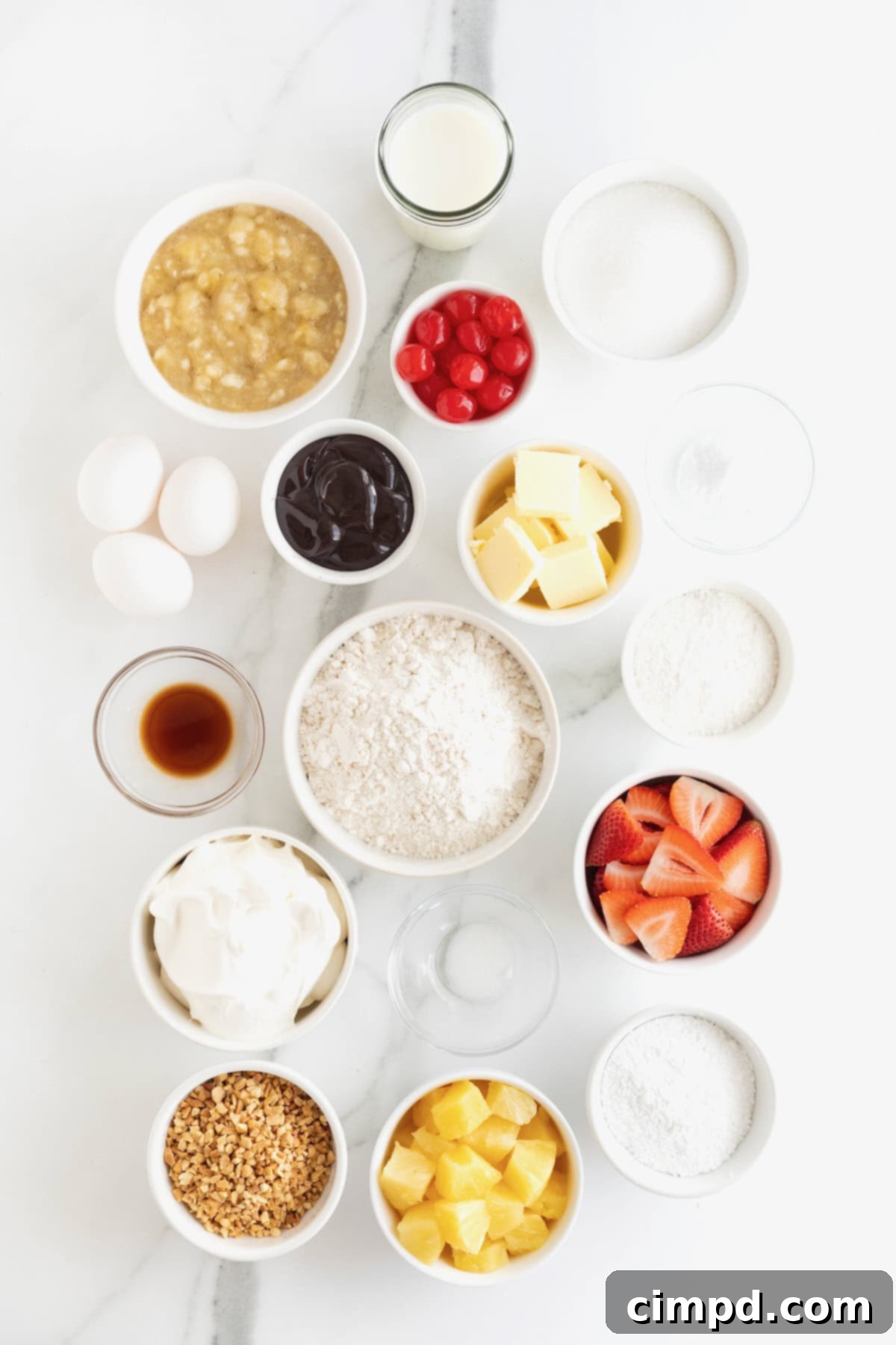 Banana Split Dream Cake 5 A collection of ingredients neatly laid out, ready to be transformed into a delicious Banana Split Cake.