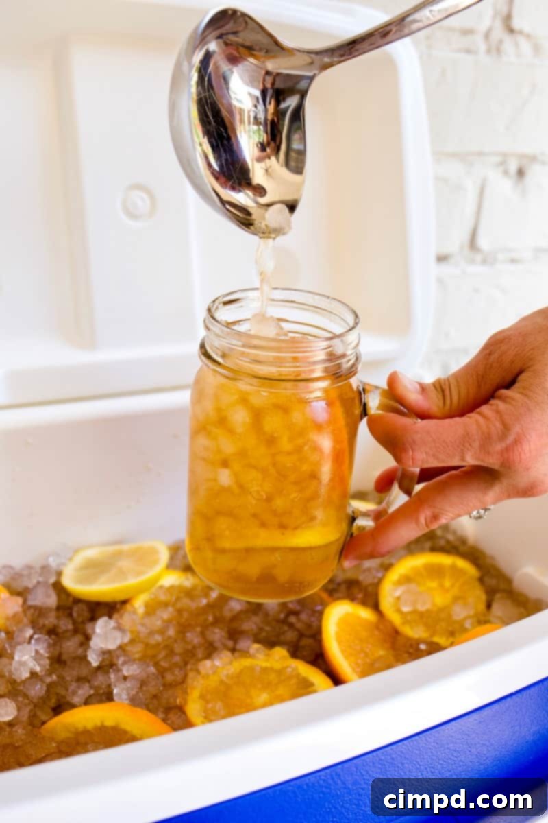 Cooler Tea Refreshment 4 Ice Chest Tea being served from a cooler