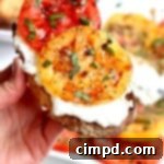Burrata and Heirloom Tomato Toast 2 Delicious Burrata and Heirloom Tomatoes with Toasted Bread recipe card image.