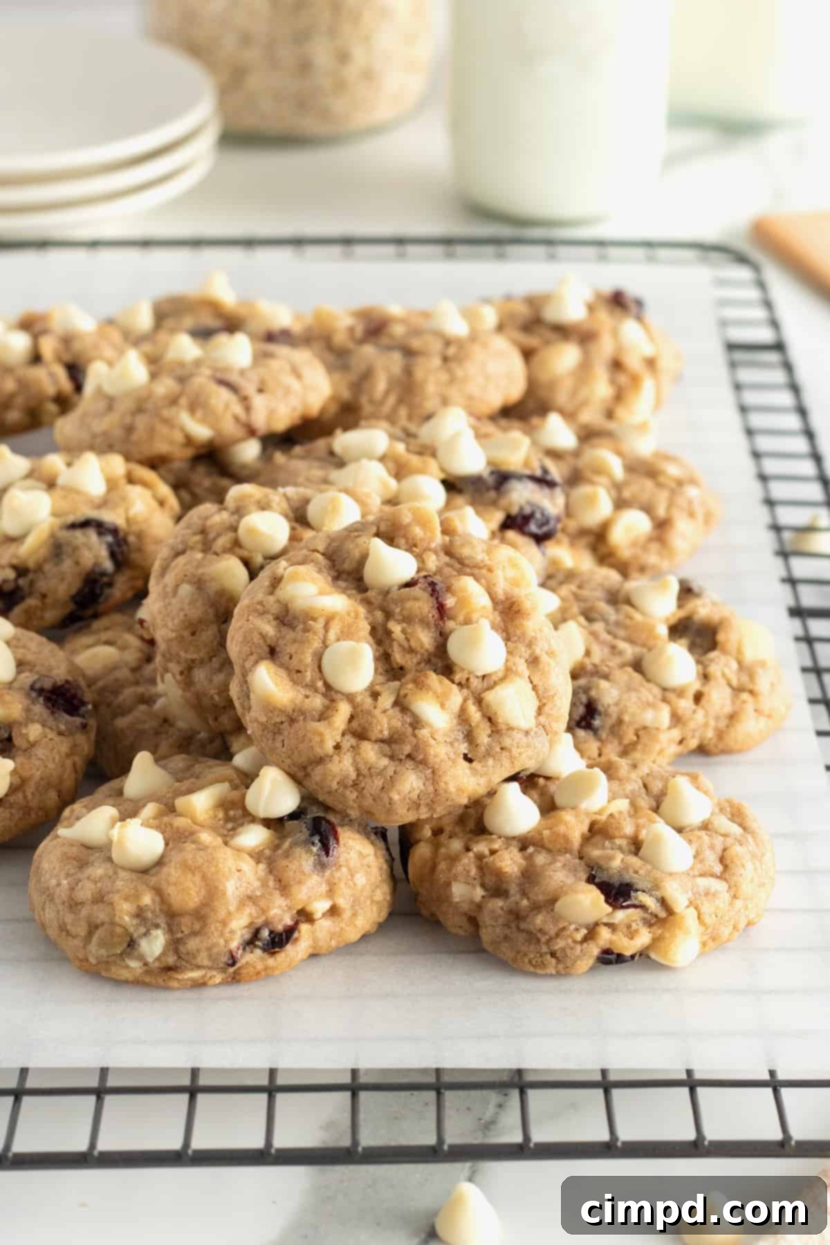 White Chocolate Chip Macadamia Nut Oatmeal Cranberry Cookies 4 Oatmeal Cranberry White Chocolate Macadamia Nut Cookies cooling on a rack