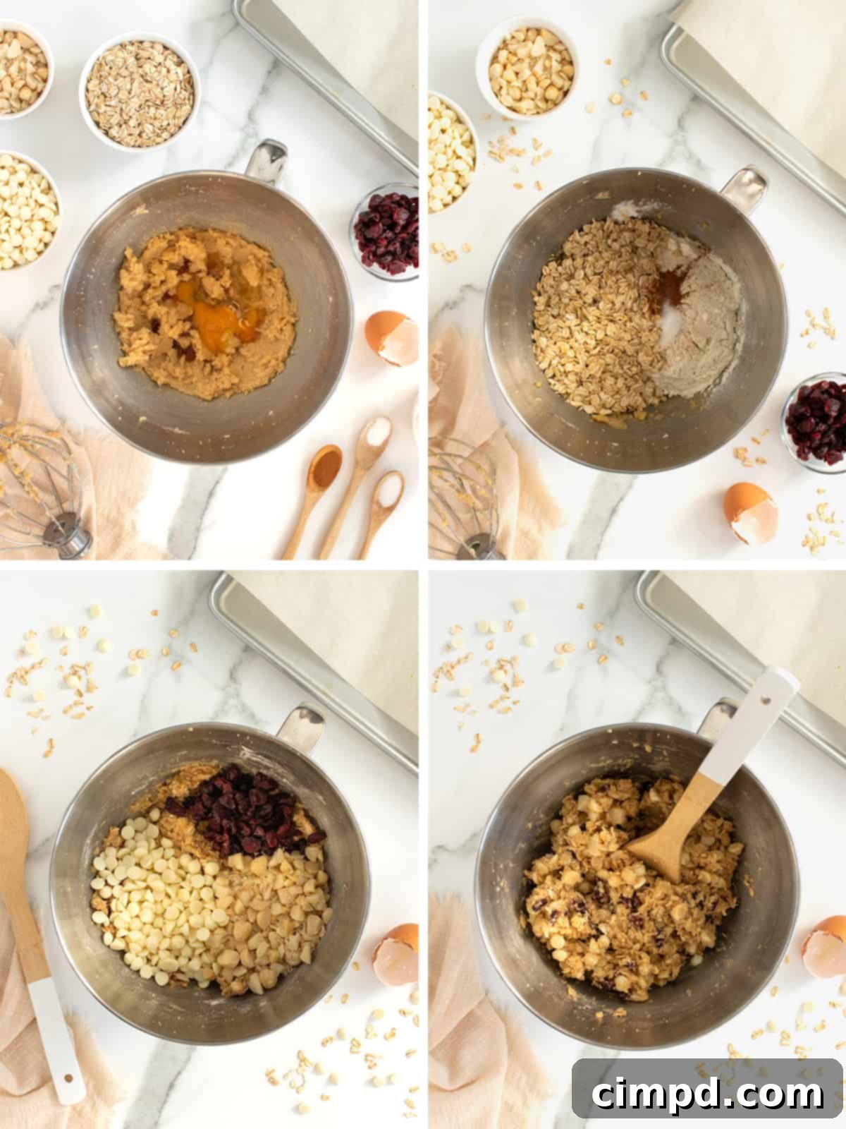 White Chocolate Chip Macadamia Nut Oatmeal Cranberry Cookies 6 Raw cookie dough balls on a baking sheet before baking