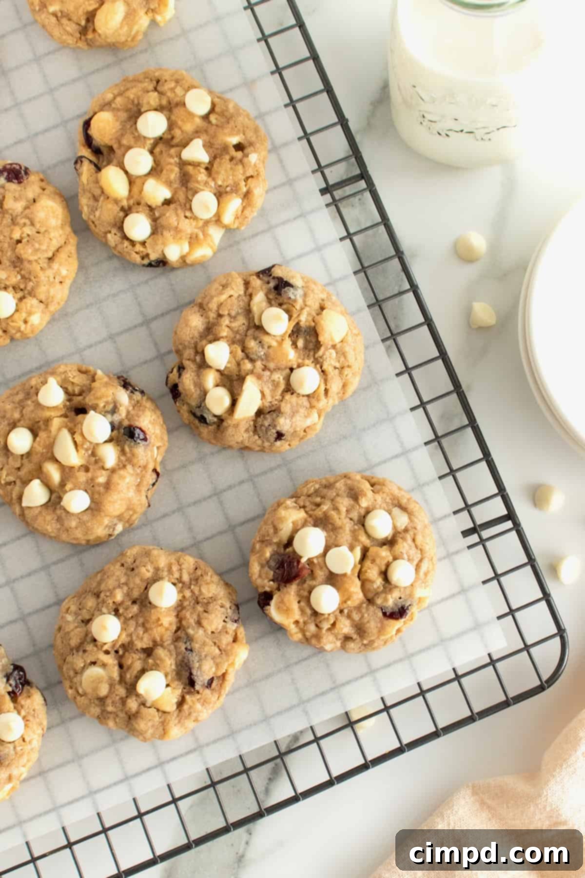 White Chocolate Chip Macadamia Nut Oatmeal Cranberry Cookies 8 Oatmeal Cranberry White Chocolate Chip Macadamia Nut Cookies cooling on a wire rack