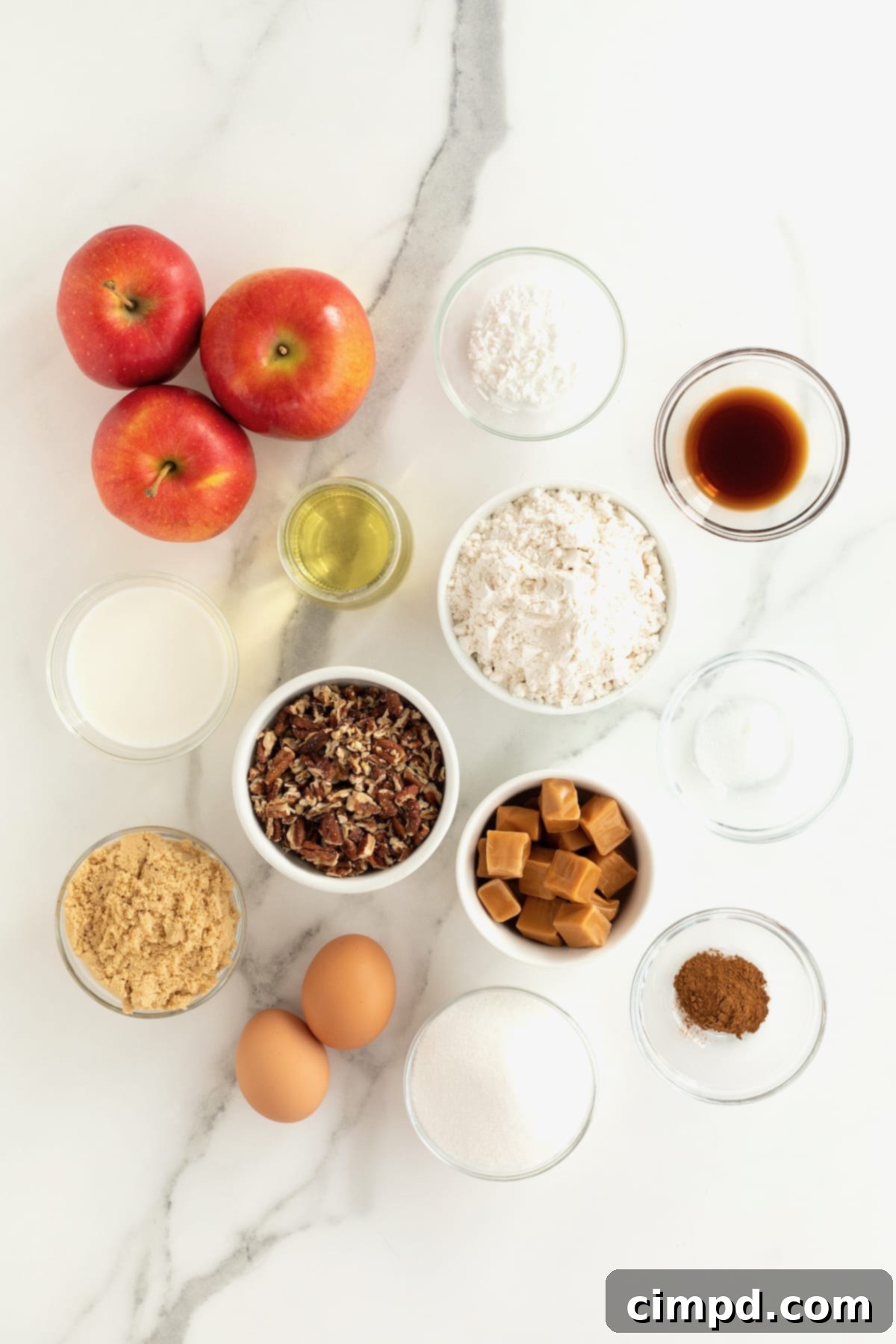 Gourmet Caramel Apple Cupcakes 5 A visual compilation of all the ingredients laid out neatly, ready to be transformed into delicious Caramel Apple Cupcakes.