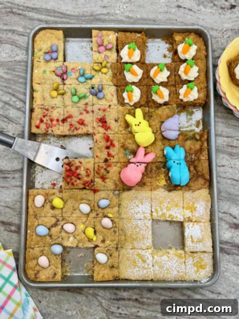 Easter themed cookie bars on an aluminum baking sheet.