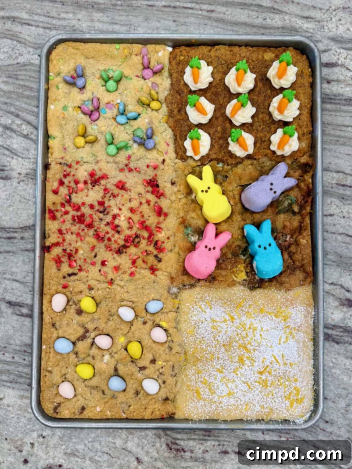 A sheet pan of six kinds of cookies decorated for Easter.