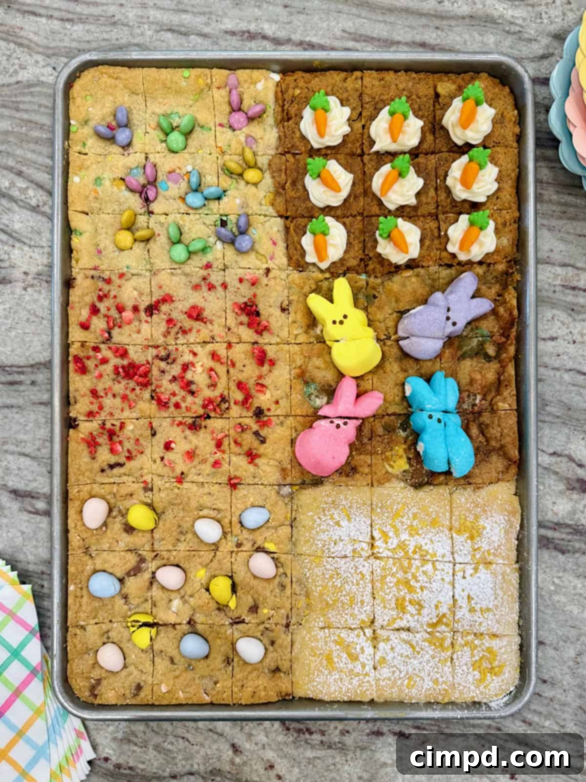 54 cookie bars in a sheet pan decorated for Easter.