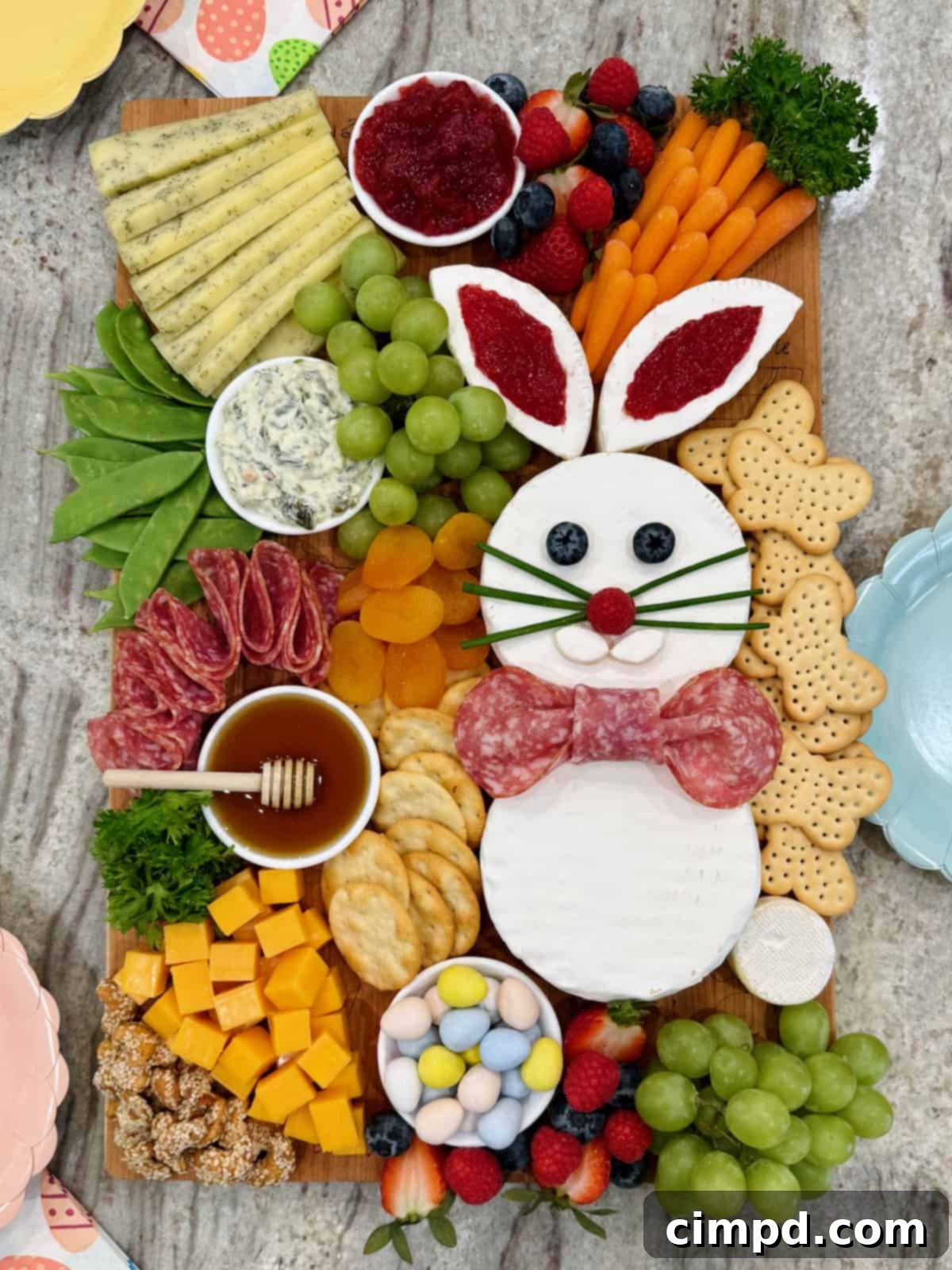 Easter Bunny Autograph Board 2 Easter Bunny Charcuterie Board: A delightful brie bunny with a salami bow tie, surrounded by cheese, fruits, veggies, and crackers.