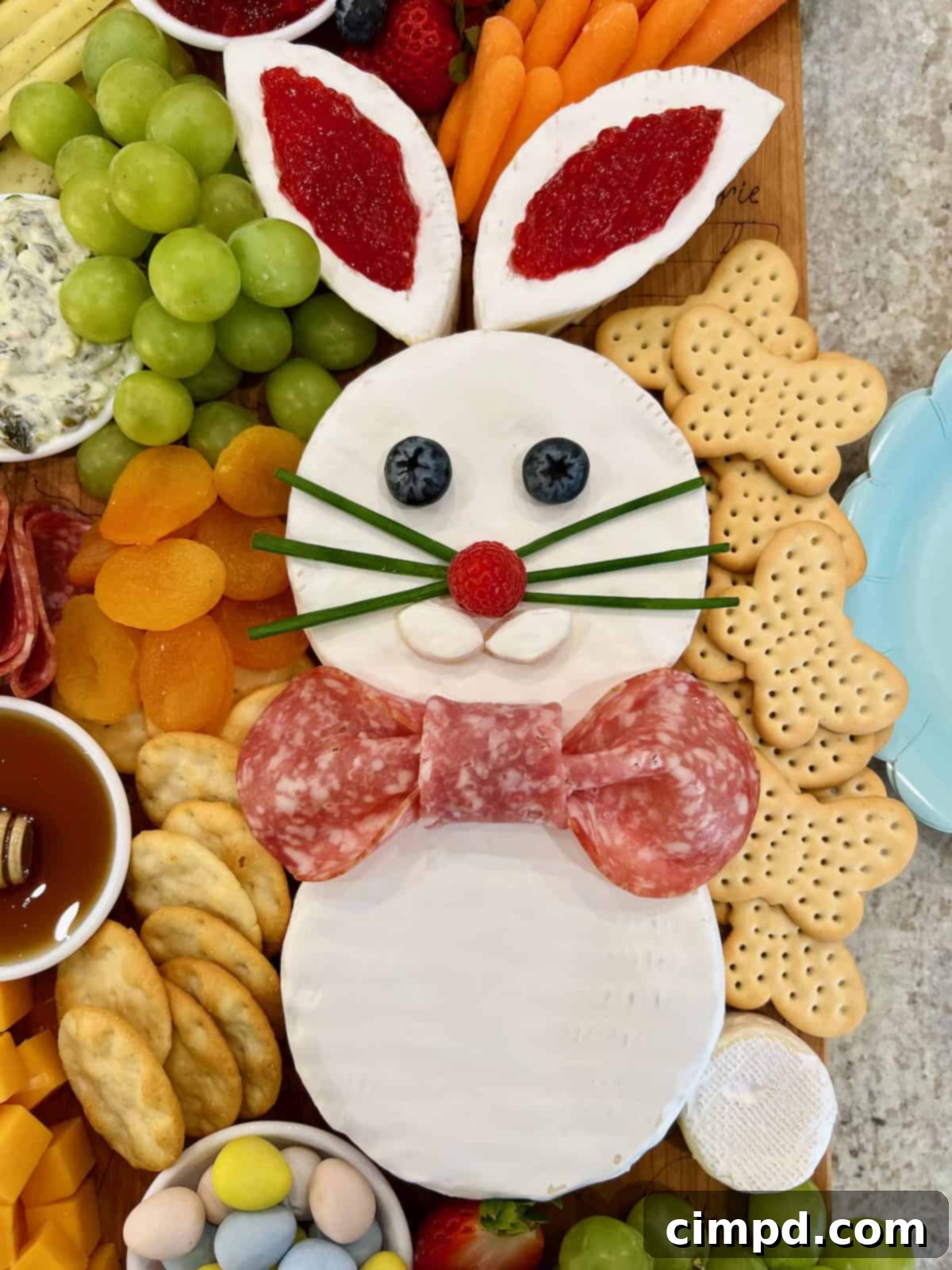Easter Bunny Autograph Board 7 Easter Bunny Charcuterie Board featuring salami, crackers, and the brie bunny.